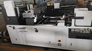 ماكينة تركيب الفتحات في صناديق الكرتون